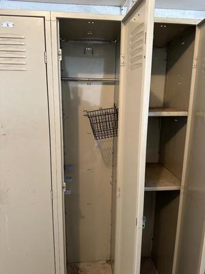 A SECTION OF 3 SCHOOL LOCKERS SLIGHTLY MODIFIED