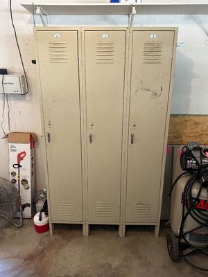 A SECTION OF 3 SCHOOL LOCKERS SLIGHTLY MODIFIED