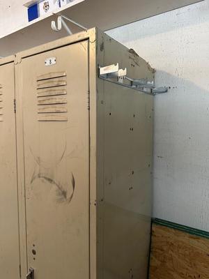 A SECTION OF 3 SCHOOL LOCKERS SLIGHTLY MODIFIED