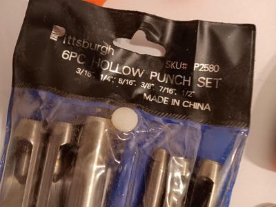 Variety of hand tools - Hollow punch set - Clamps - screwdrivers - pliers and more