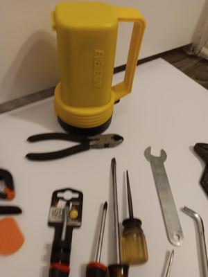 Variety of hand tools - Hollow punch set - Clamps - screwdrivers - pliers and more