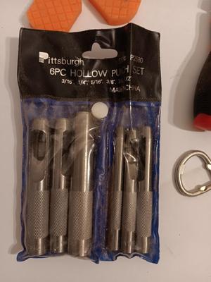 Variety of hand tools - Hollow punch set - Clamps - screwdrivers - pliers and more