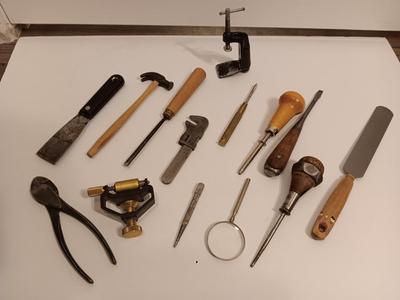 Assortment of older hand tools most with wooden handles