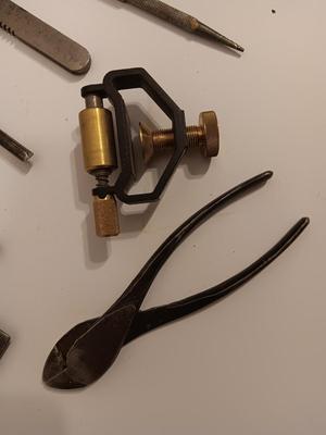 Assortment of older hand tools most with wooden handles