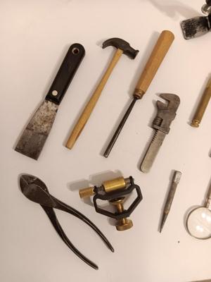 Assortment of older hand tools most with wooden handles