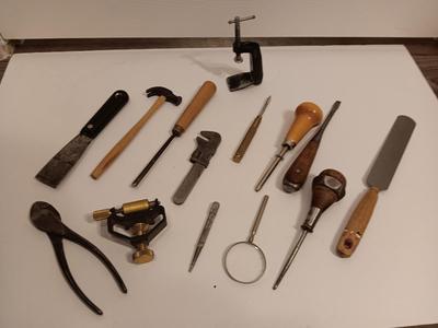 Assortment of older hand tools most with wooden handles