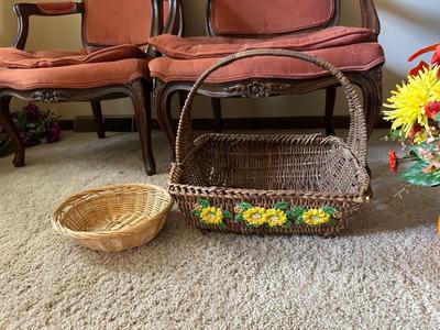 WICKER BASKETS AND FAUX FLOWERS IN A VASE