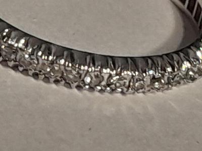 Engagement band missing some stones
