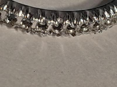 Engagement band missing some stones