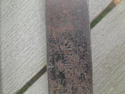 Antique wooden Peerless level with hand saw claw bar and leather gloves