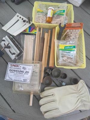 Task self-centering Doweling Jig Assortment of woodworking items and supplies