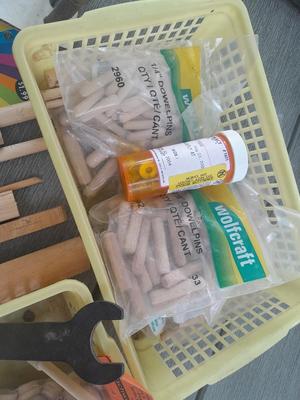 Task self-centering Doweling Jig Assortment of woodworking items and supplies