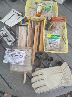 Task self-centering Doweling Jig Assortment of woodworking items and supplies