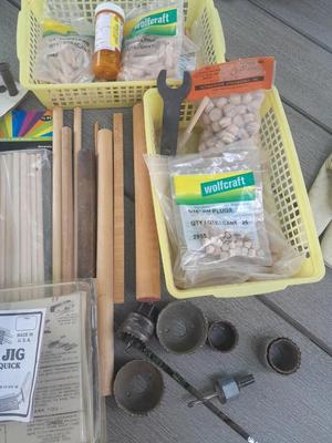 Task self-centering Doweling Jig Assortment of woodworking items and supplies