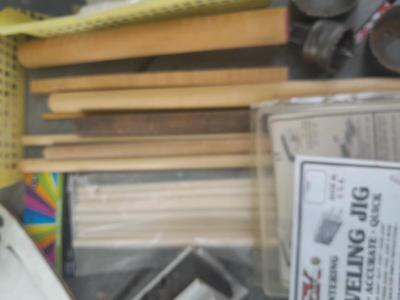 Task self-centering Doweling Jig Assortment of woodworking items and supplies