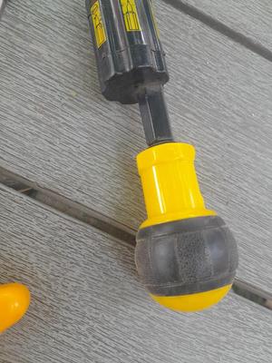 Assortment of yellow handled tools - wire strippers - tin snips= and drivers with bits