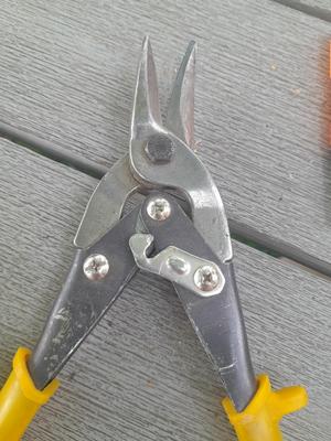 Assortment of yellow handled tools - wire strippers - tin snips= and drivers with bits