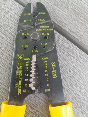 Assortment of yellow handled tools - wire strippers - tin snips= and drivers with bits