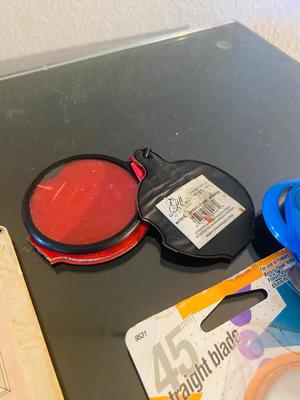 A Different Assortment of Office Needs - rolling cutter - vintage tape measure - and more