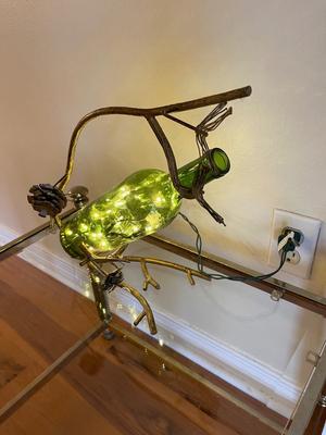 Bronzed wine holder