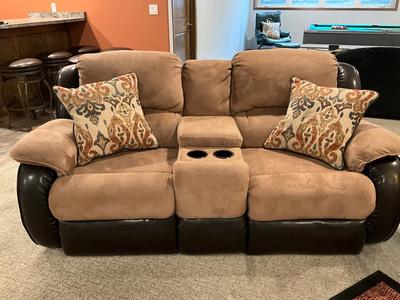 Beautiful faux leather/suede love seat with 2 recliners