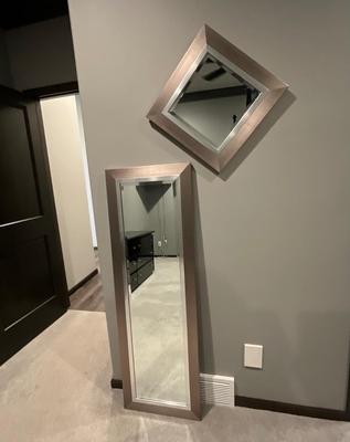 Mirrors, brushed nickel w/purple tint.