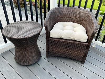 Brown wicker chair and side table