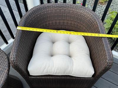 Brown wicker chair and side table