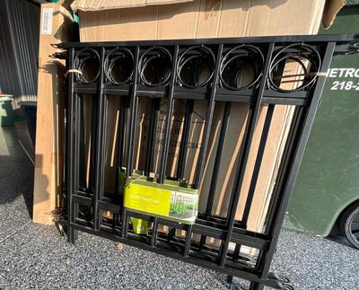 Metal fence with 17 sections