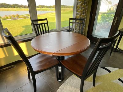 Round drop leaf table with 4 chairs
