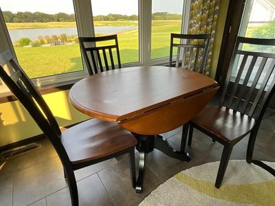 Round drop leaf table with 4 chairs