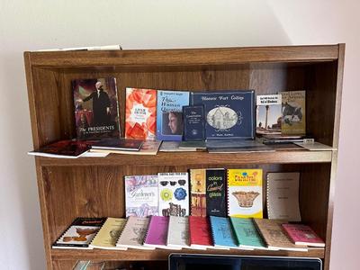 AN ASSORTMENT OF BOOKS (7)