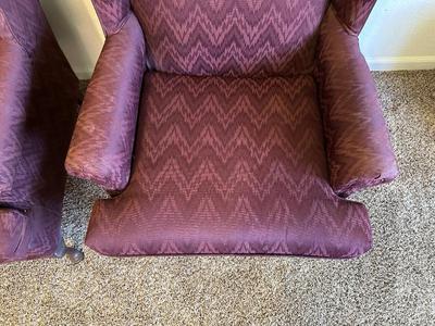 2 BURGUNDY WING BACK CHAIRS AND 1 OTTOMAN