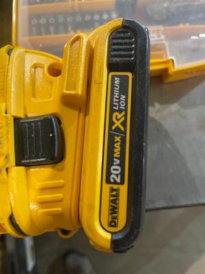 S49.5-Dewalt cordless impact driver with battery, battery charger, and reciprocating saw with battery, bits and a Dewalt bag