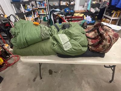 A44-Sleeping bags x 4 plus Duffle bag