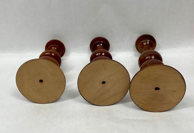 A lot of three wooden candleholders handmade
