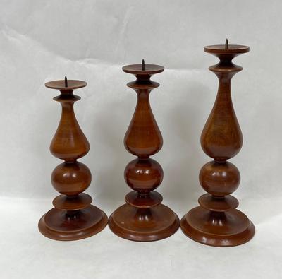 A lot of three wooden candleholders handmade