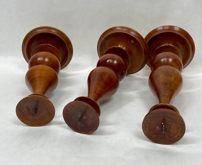A lot of three wooden candleholders handmade