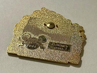 Disney Happy Birthday Button and part of a Disney Trading Pin