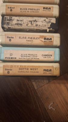 12 8 track tapes in carry case