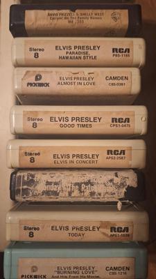 12 8 track tapes in carry case