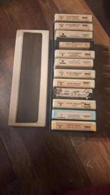 12 8 track tapes in carry case