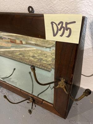 D35-framed beveled mirror with coat hooks