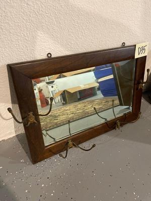 D35-framed beveled mirror with coat hooks