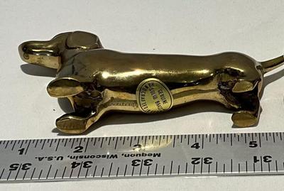 2 Solid Brass Dogs