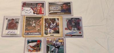 8 signed sport card including Lamar Jackson, Matt Carpenter