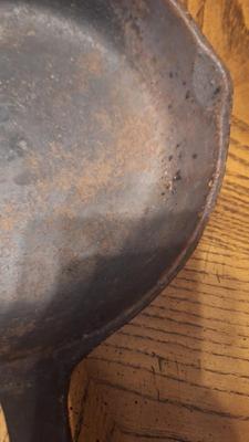 8 inch cast iron skillet w/ heat ring.