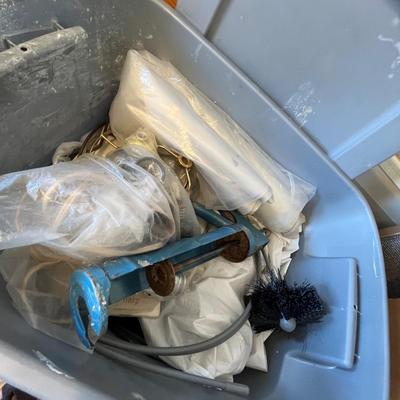 Tote of painting supplies