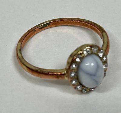 Fashion Jewelry Ring - light blue stone surrounded by clear rhinestones