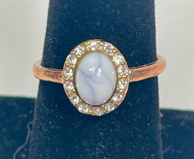 Fashion Jewelry Ring - light blue stone surrounded by clear rhinestones